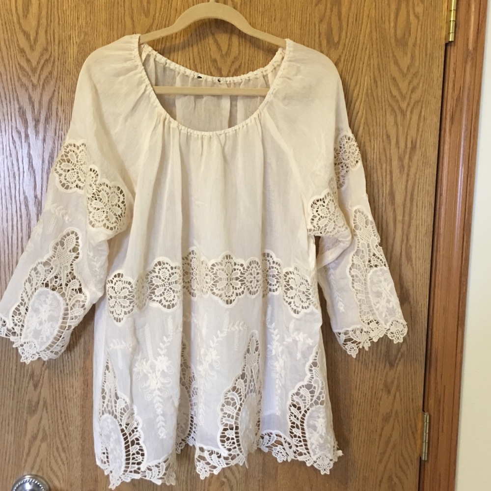 Beautiful cream colored Lacey pullover blouse